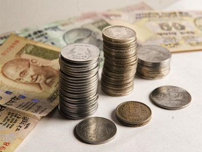 Rupee edges up 7 paise against dollar