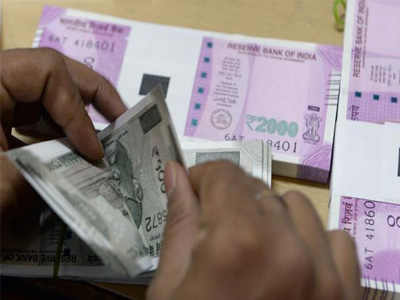 Rupee hits three-week low against US dollar