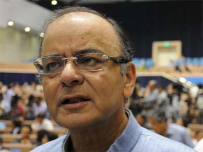 Finance Minister and RBI Governor bat for Aadhaar