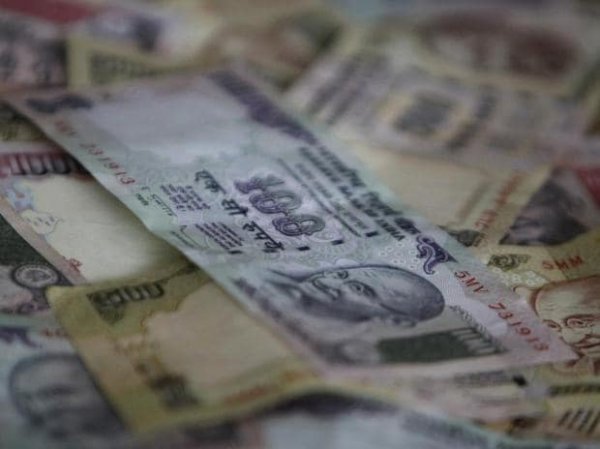 Rupee gains 20 paise to 74.45 against US dollar in early trade