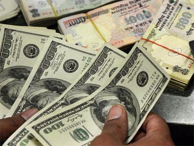 Rupee inches up 8 paise against dollar