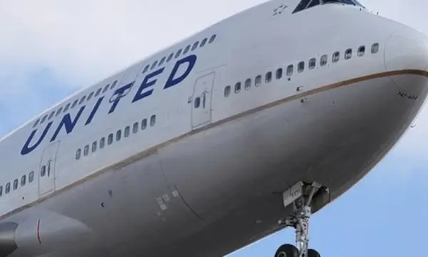 United Airlines makes emergency landing as open-door warning goes off