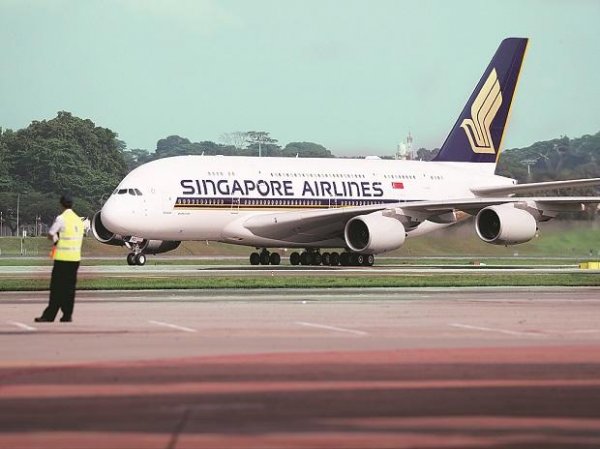 Singapore Airlines begins flights with fully Covid-19 vaccinated crew