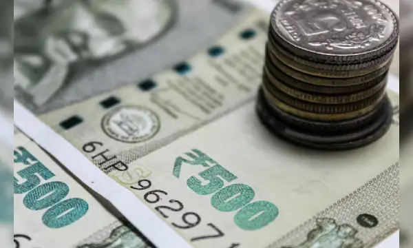 Rupee touches lifetime low of 83.48 vs dollar after Fed's hawkish comments