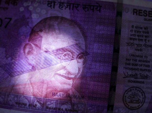 Rupee strengthens 14 paise to 74.44 against US dollar in early trade