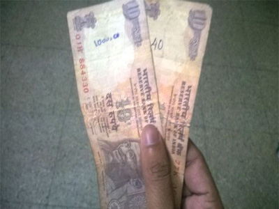 RBI dismisses rumours, says rupee notes with writing are legal