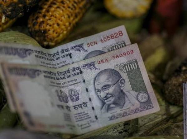 Rupee spurts by 41 paise to close at nearly two-week high of 76.20