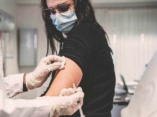 China vaccinating almost 14 million people a day, fastest in world
