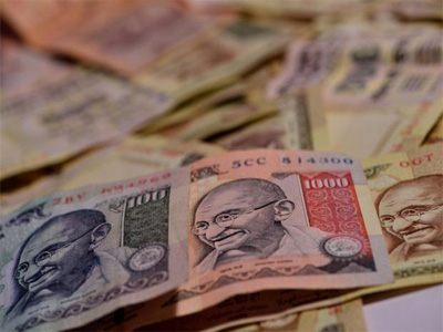 Rupee closes up marginally against US dollar
