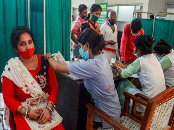 WHO chief congratulates PM, health workers as India hits vaccine milestone