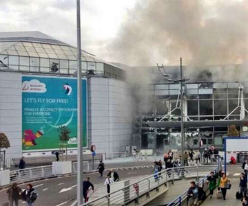 At least 13 dead as twin blasts rock Brussels airport