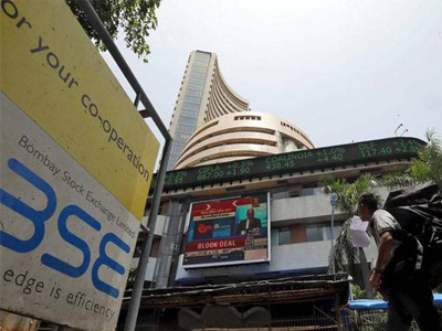 Sensex, Nifty a tad higher as assembly results limit gains