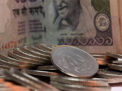 Rupee rises 36 paise to 69.78 per US dollar in morning trade on falling crude prices