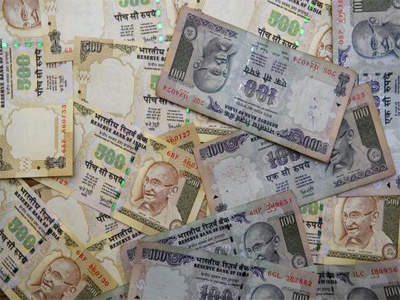 Rupee trades higher at 66.60 against US dollar