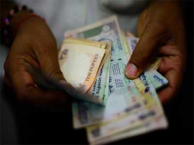 Rupee closes 7 paise weaker against US dollar at 66.52