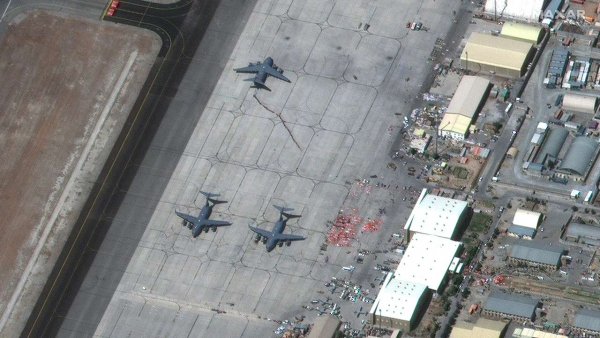 US airstrike targets Islamic State in Afghanistan after deadly Kabul blasts that killed 13 military personnel