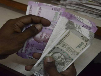 Rupee trades flat at 63.55 against dollar