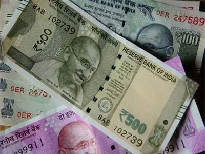 Rupee opens marginally higher against US dollar