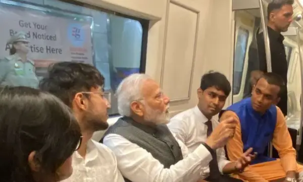 PM Modi takes metro to attend Delhi University's centenary celebrations, interacts with passengers