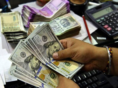 Rupee surges 30 paise against US dollar