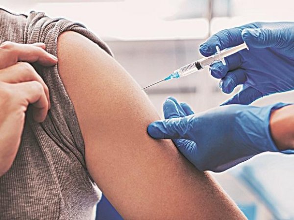 Vaccine day in Britain; Americans await regulator's nod for vaccine