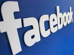 Facebook sets record as 1 bn users log on in a single day
