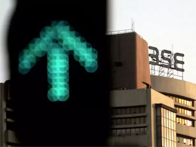 Sensex jumps over 200 points, Rupee rebounds 7 paise against dollar